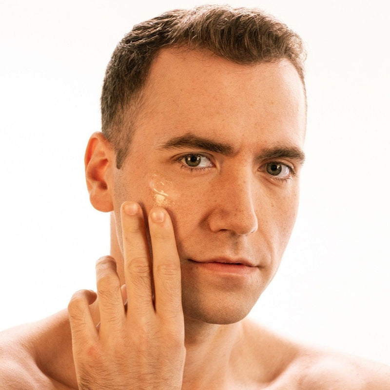 man with serum on face